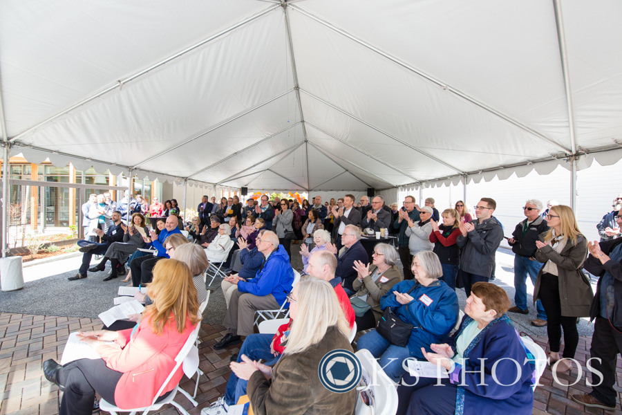 Compass Broadview people under tent for grand opening